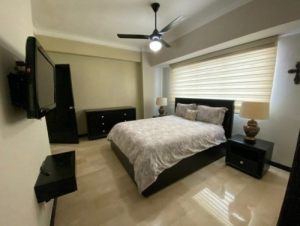Furnished apartment for sale in Ensanche Naco, Santo Domingo. 2 bedrooms, 2.5 baths. For more information, contact us.  Santo domingo